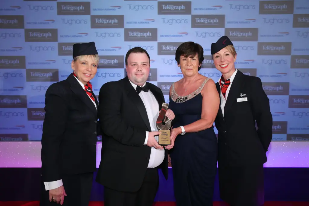 Jonny collecting award